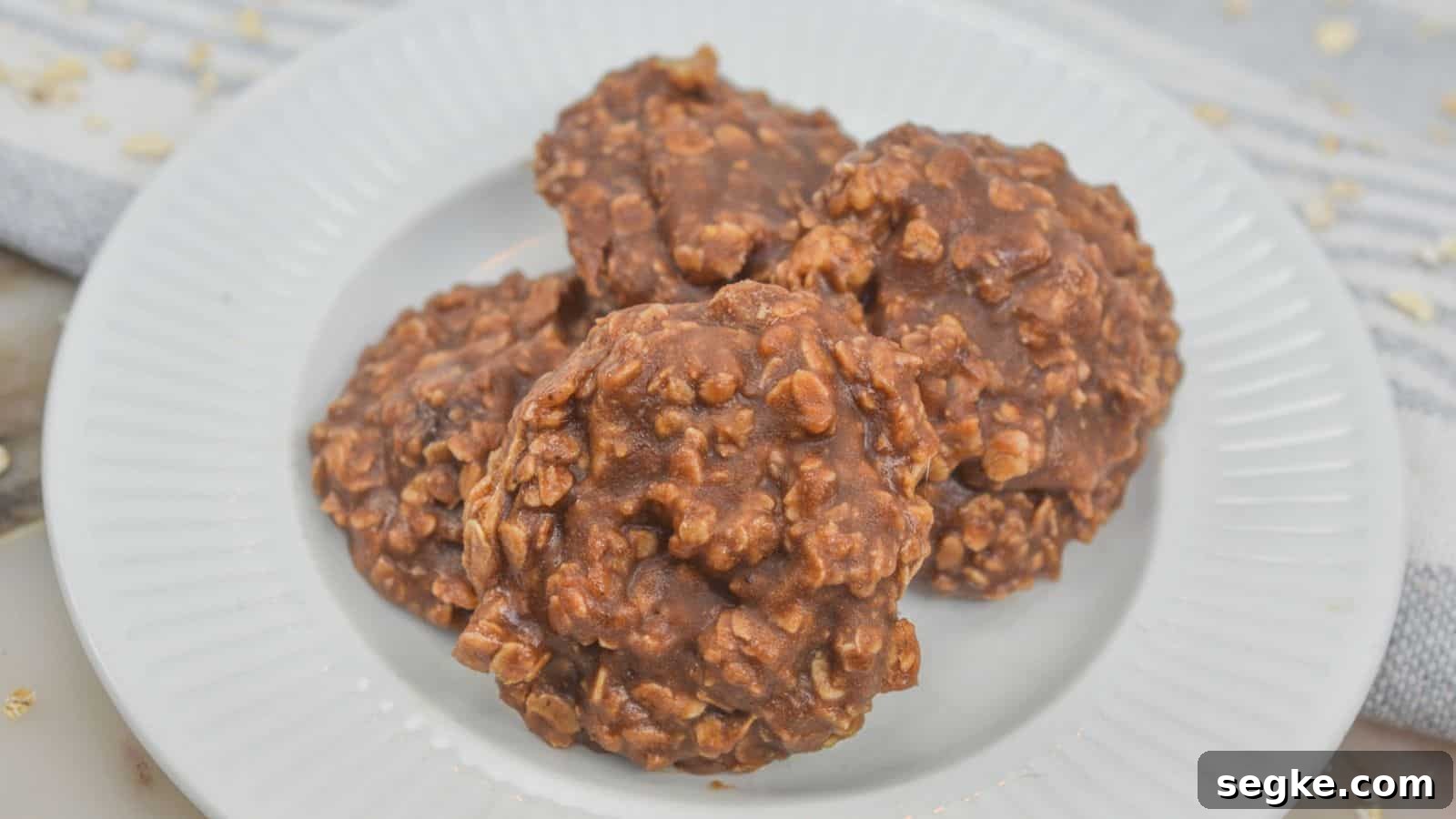 Chocolate oatmeal no-bake cookies on a white plate.