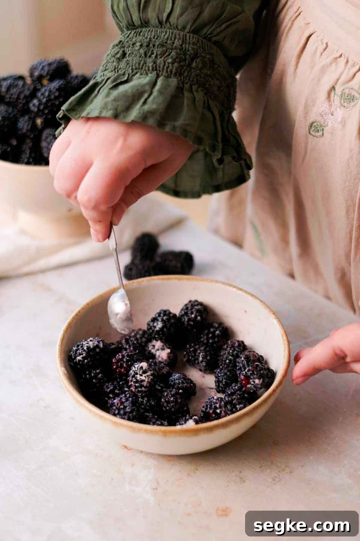 Blackberry Muffins Recipe: Fluffy, Juicy, Homemade 6 coating blackberries in flour