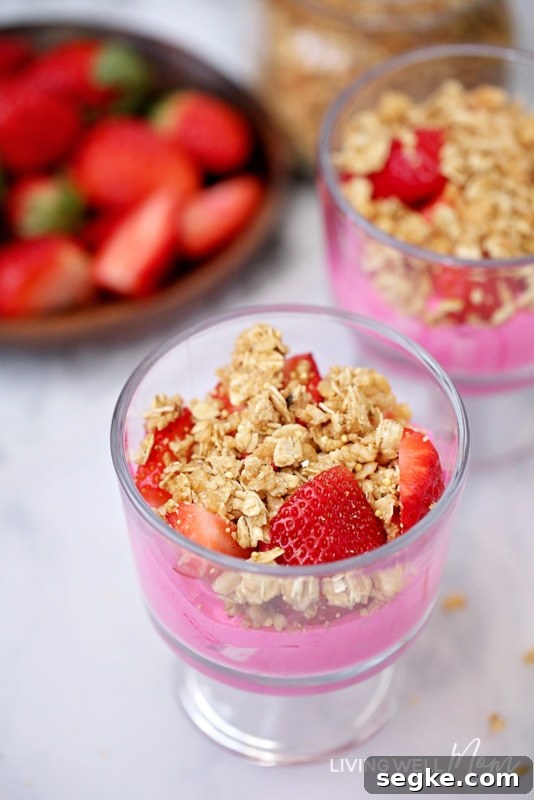 Easy Valentine’s Day Trifle recipe for kids - with yogurt, granola, and strawberries, this festive treat is perfect for a fun valentine’s day snack or even breakfast. It’s quick and easy to make and best of all, a healthier alternative to candy!