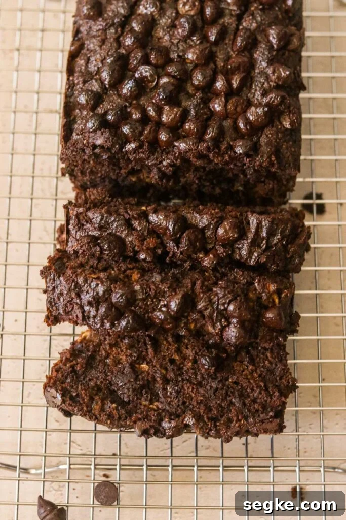 Gluten-Free Chocolate Zucchini Bread (Grain-Free Paleo Recipe) 2 Chocolate zucchini bread on a cooling rack cut into slices