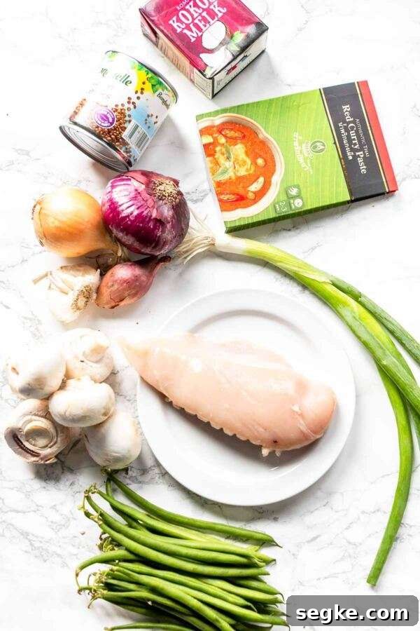Instant Pot chicken curry with coconut milk and lots of vegetables. Great to serve with a steaming bowl of rice or chewy quick naan bread.