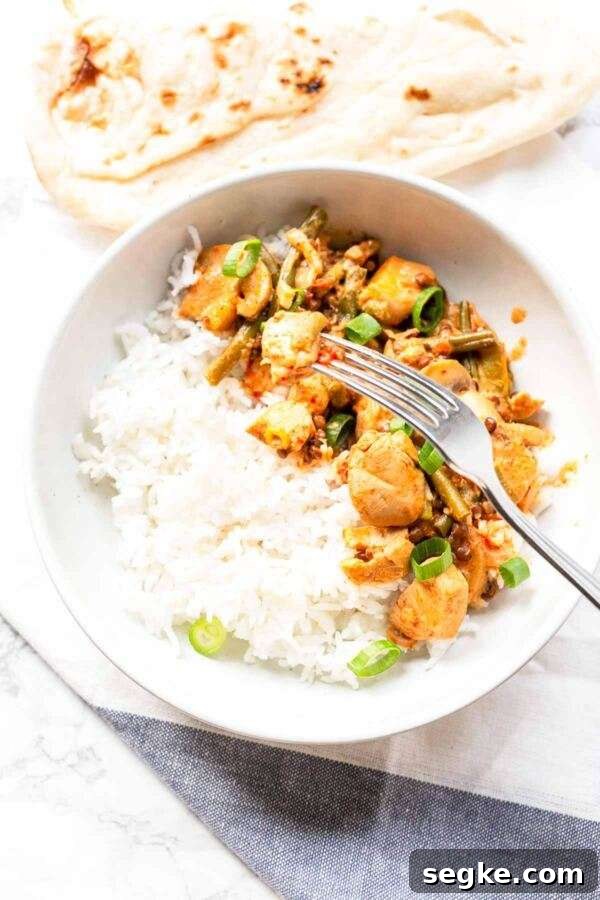 Instant Pot Chicken with coconut milk and lots of vegetables. A thick and rich pressure cooker chicken curry in a creamy slightly coconut sauce that tastes amazing.