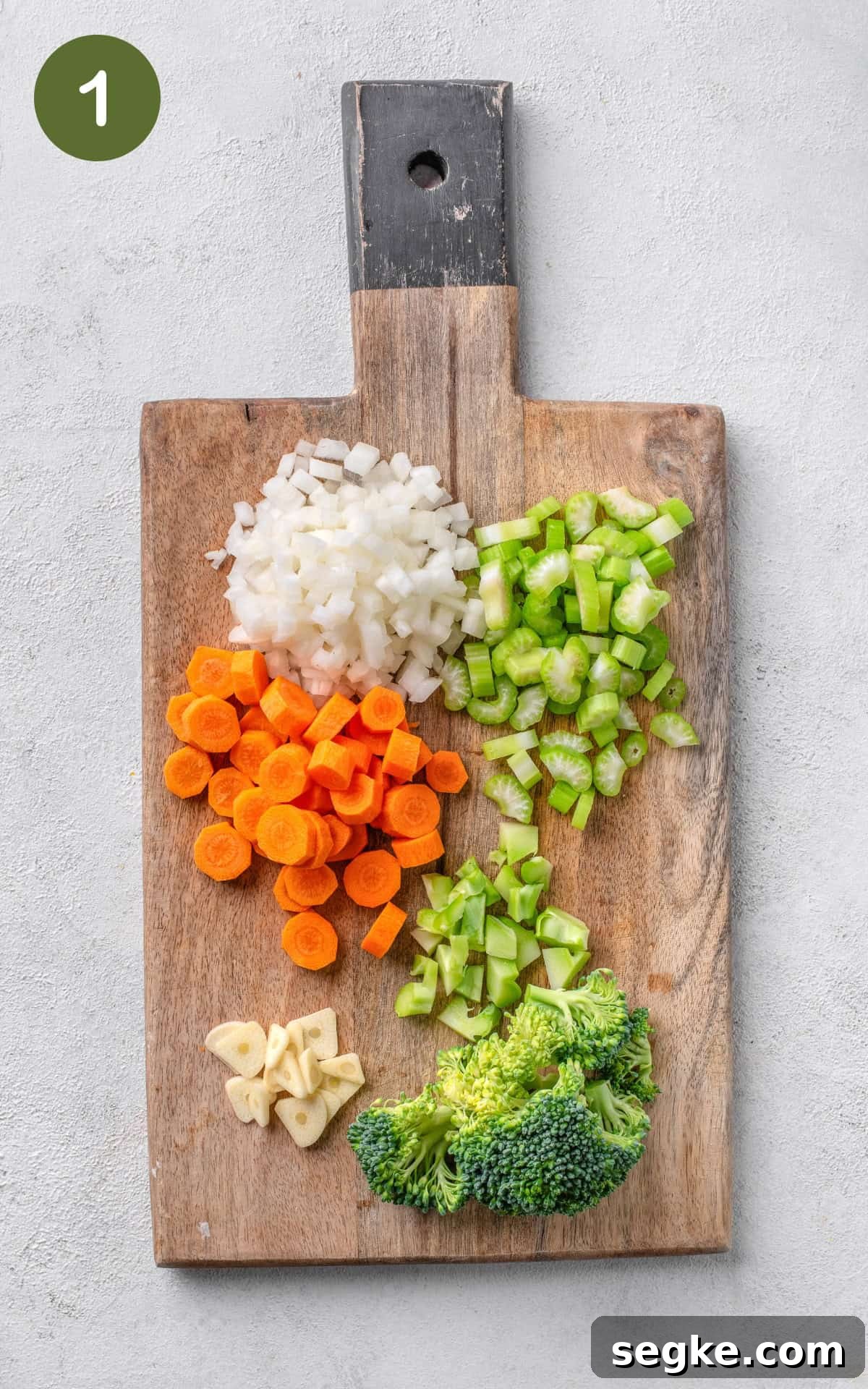 colourful vegetables on a wooden cutting board.