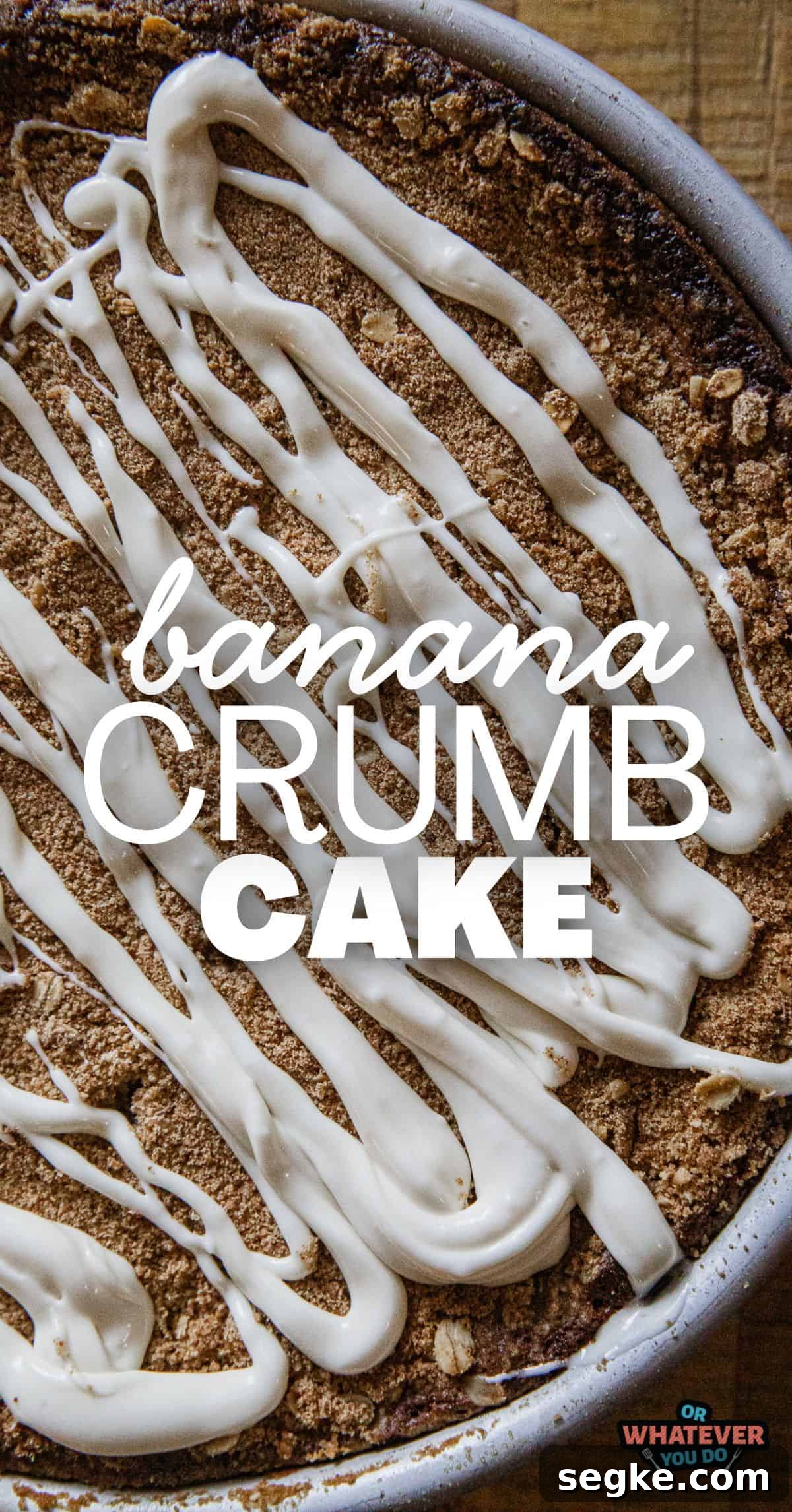 Delicious banana crumb cake with a crunchy topping and drizzled icing. Perfect for breakfast or dessert.