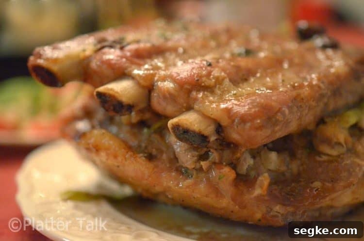 A close up of a baked sparerib sandwich