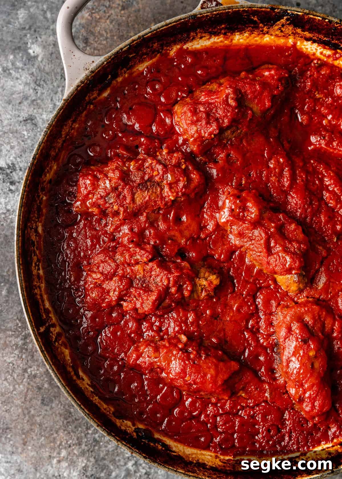 closeup overhead: ready to serve braciole in skillet pan