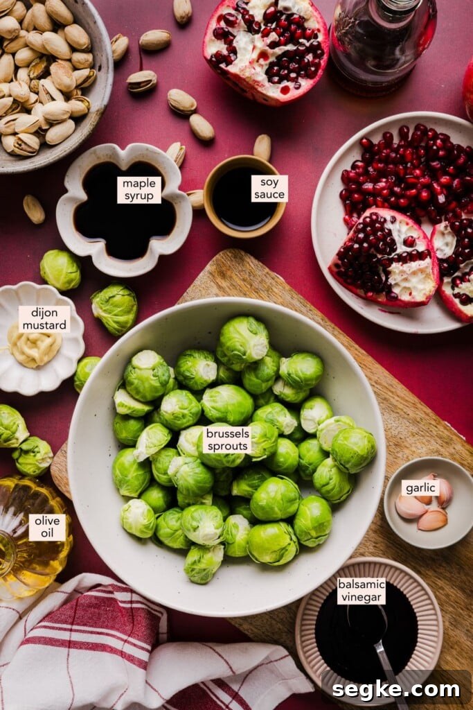 Ingredients for maple balsamic brussels sprouts on a cranberry colored table top.