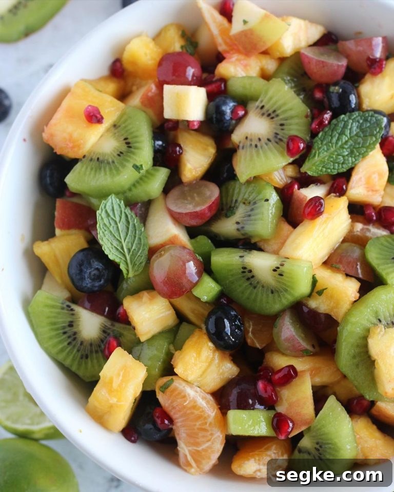 Fruit salad close-up with mint