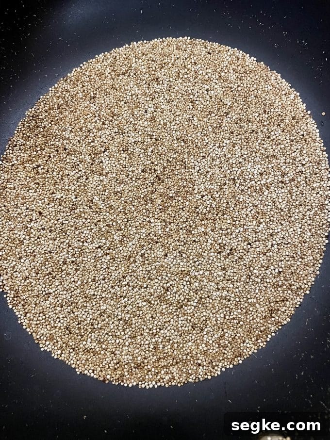 Passover Crunchy Quinoa Chocolate Bars 4 Toasting quinoa in a skillet