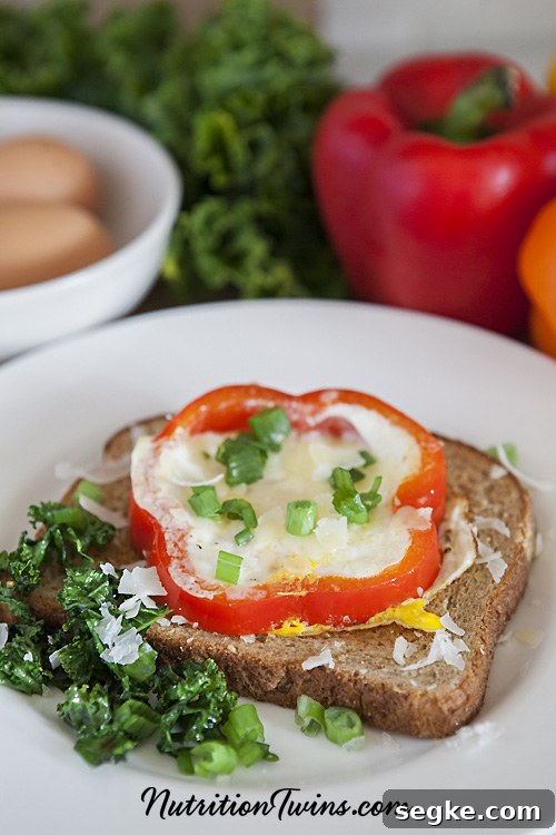 Baked Parmesan Eggs in Bell Pepper Rings 2 Parmesan eggs cooked in a bell pepper ring on toast