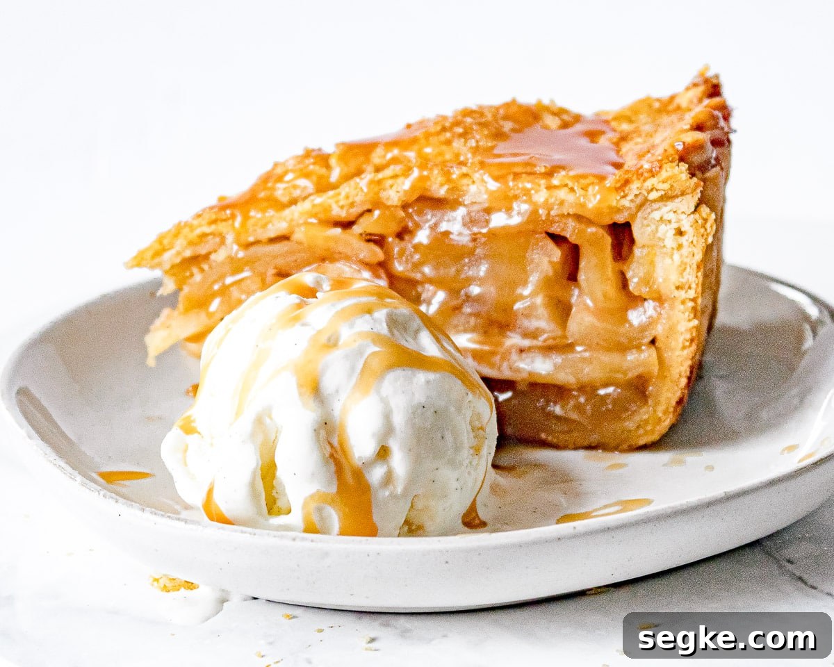 Caramel Apple Deep-Dish Pie Recipe 3 Side view of slice of deep dish caramel apple pie