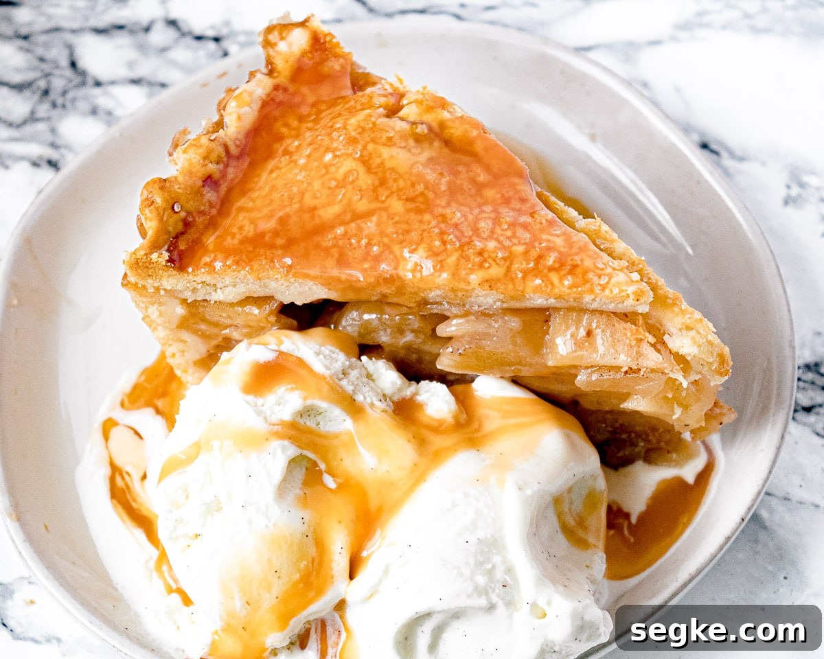 Caramel Apple Deep-Dish Pie Recipe 5 slice of pie with caramel sauce and ice cream