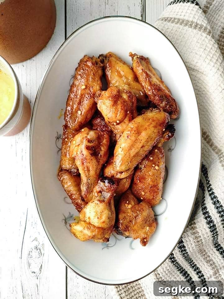 Crispy Honey Mustard Chicken Wings Recipe 2 Crispy baked chicken wings flavored with honey mustard.