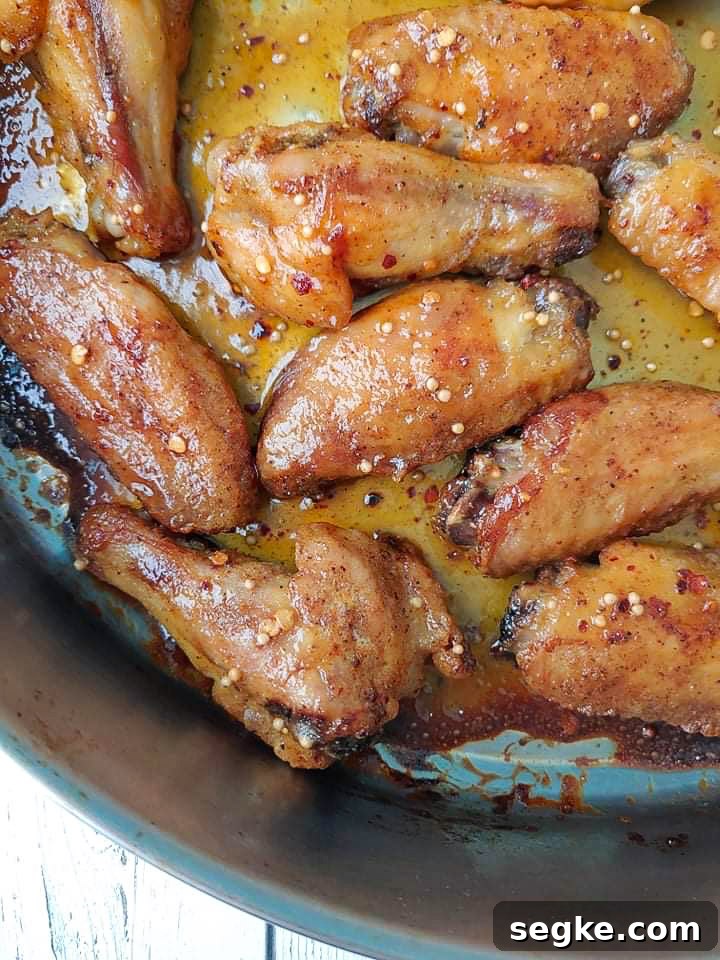 Crispy Honey Mustard Chicken Wings Recipe 6 Crispy baked chicken wings flavored with honey mustard.
