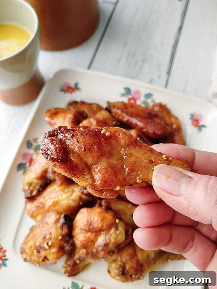 Crispy Honey Mustard Chicken Wings Recipe 7 Crispy baked chicken wings flavored with honey mustard.