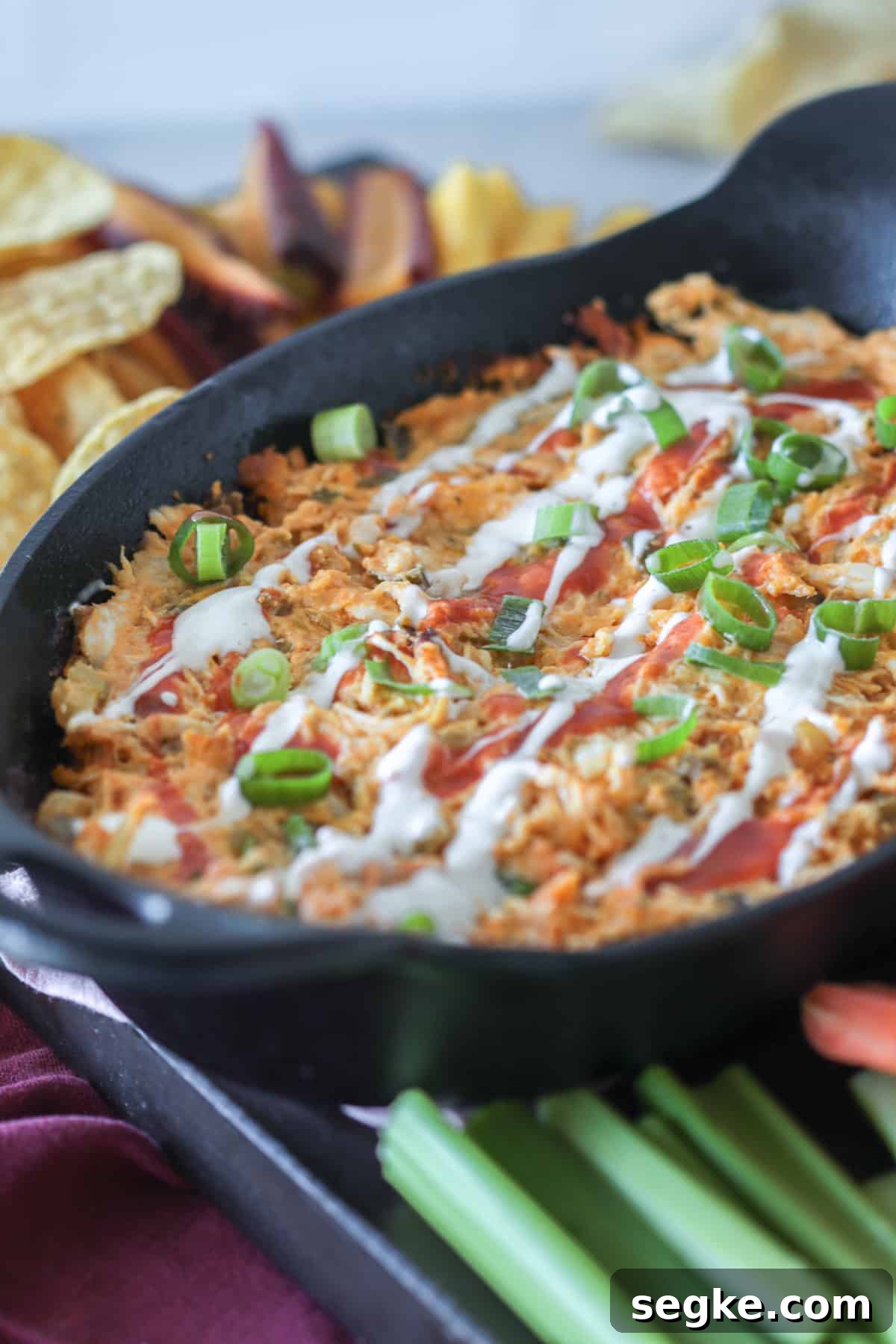Dairy-Free Buffalo Chicken Dip Recipe 2 Dairy free chicken dip in a cast iron skillet.