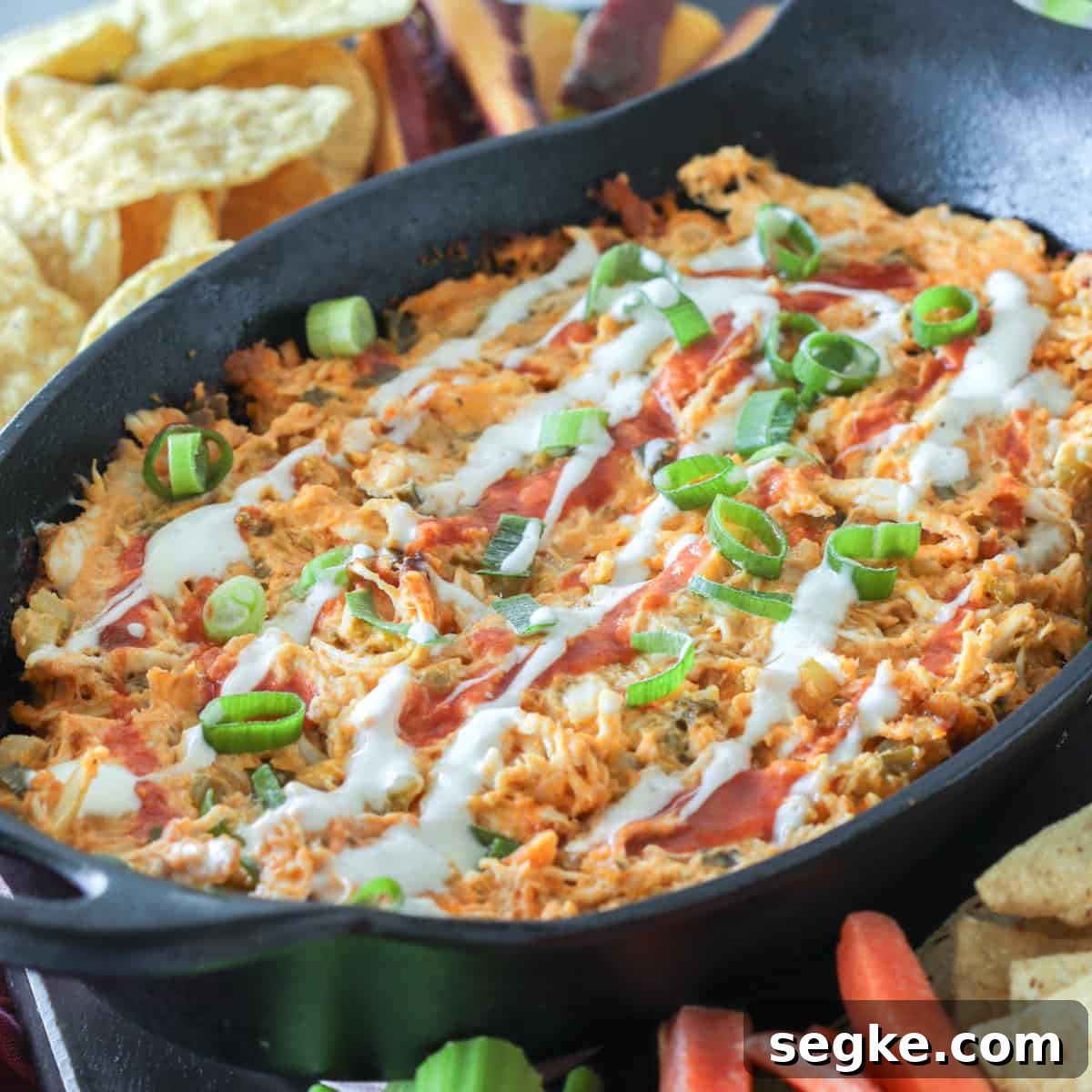 Dairy-Free Buffalo Chicken Dip Recipe 6 Buffalo chicken dip without dairy in a cast iron skillet.