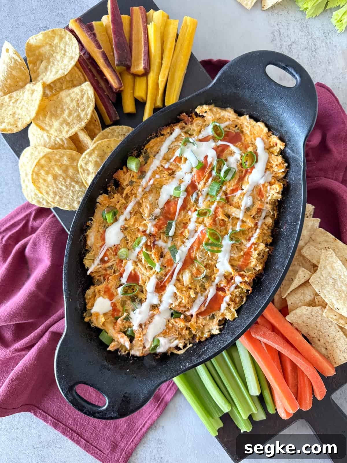 Dairy-Free Buffalo Chicken Dip Recipe 7 Dairy free buffalo chicken dip in cast iron skillet.