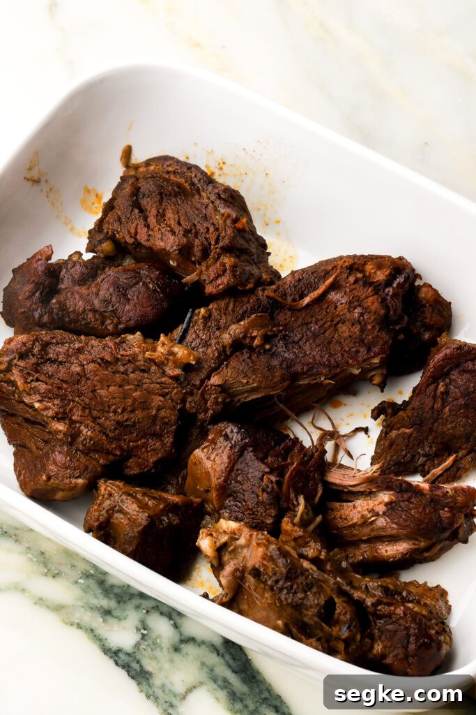 Everyday Braised Beef Recipe for Weeknight Dinners 8 beef chunks transferred to a serving dish.