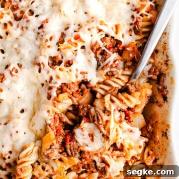 Cheesy Ground Beef Pasta Bake 8 A pasta casserole topped with cheese.