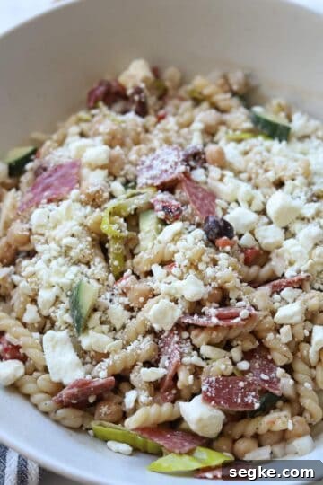 Pasta salad topped with feta cheese.