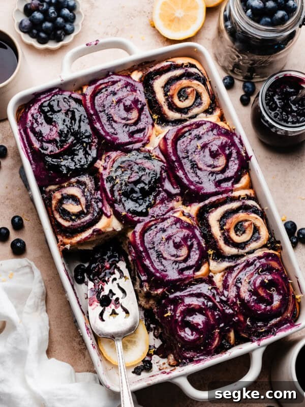 Apple Pie Cinnamon Rolls with Apple Cider Caramel Bottoms 16 Blueberry cinnamon rolls image