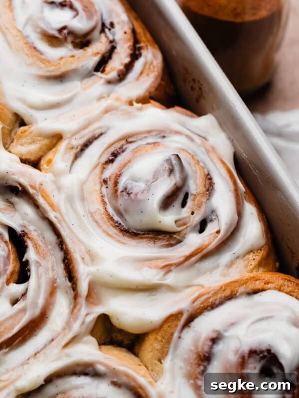 Apple Pie Cinnamon Rolls with Apple Cider Caramel Bottoms 18 Gooey cinnamon rolls image