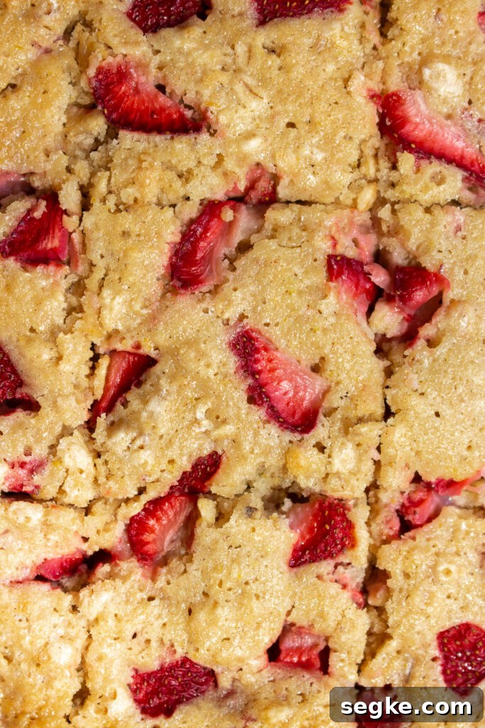 Strawberry oatmeal breakfast cake in a pan