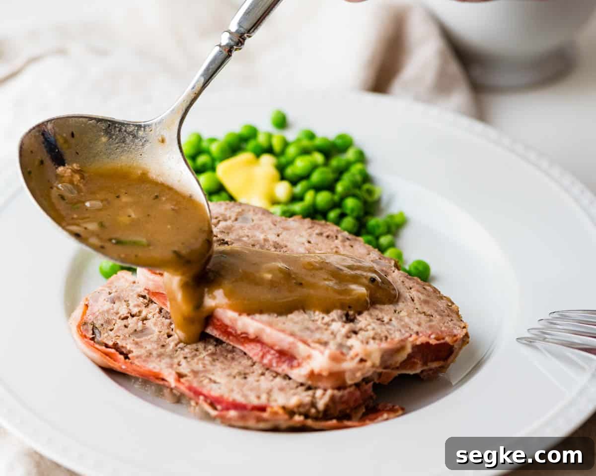 Oven Baked Meatloaf with Creamy Mushroom Gravy 2 Meatloaf with mushroom gravy.