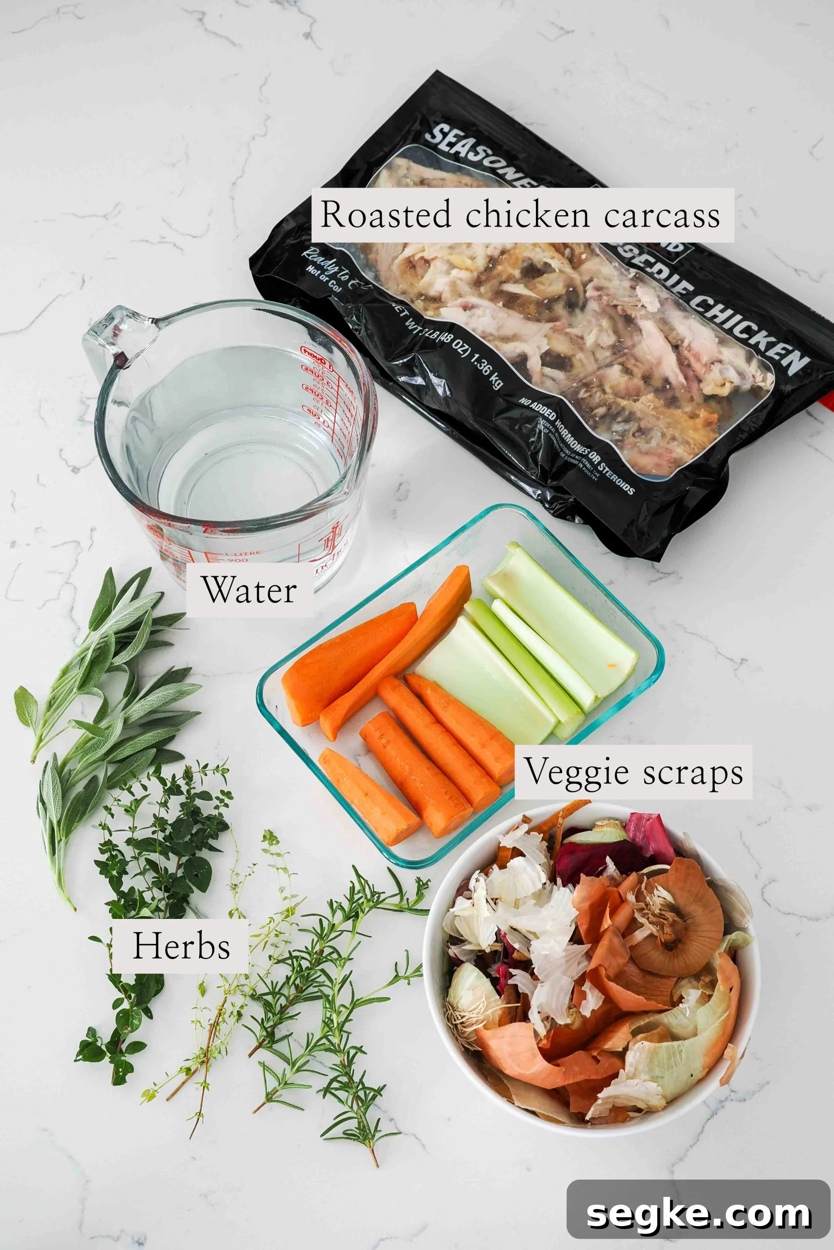 Instant Pot Chicken Bone Broth Recipe 3 Ingredients for chicken bone broth on a counter.