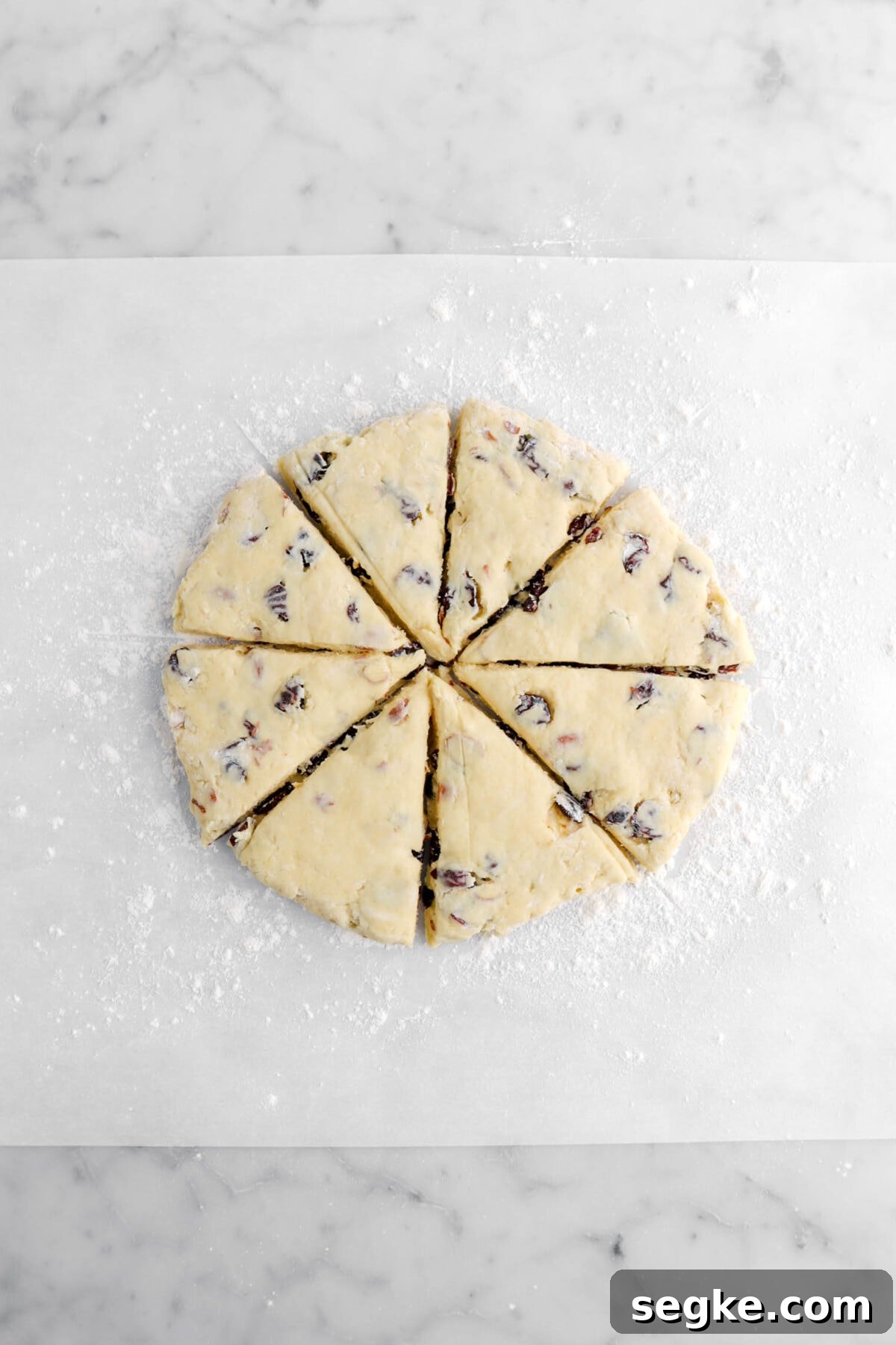 scone dough cut into eight triangles.