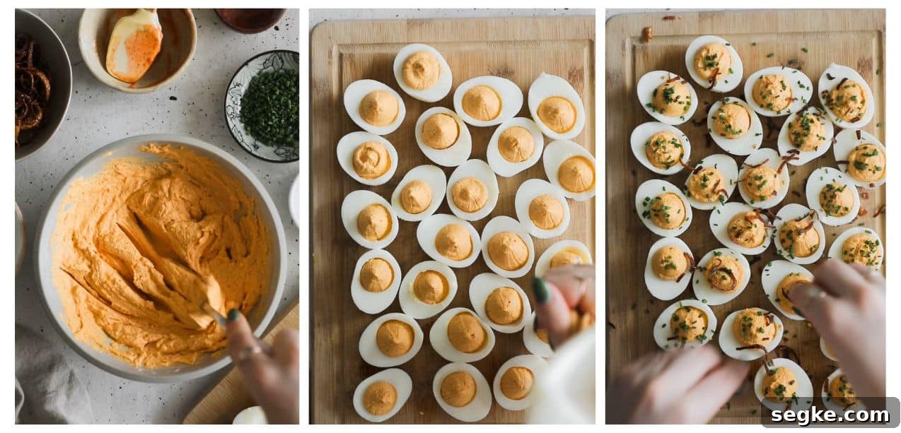 Three steps to making spicy deviled eggs. In photo 1, a hand is using a fork to mash filling in a white bowl on a white counter. In photo 2, a hand is using a piping bag to add filling to deviled eggs. In photo 3, hands are sprinkling deviled eggs with chives.
