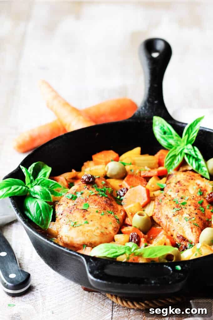 Fennel Chicken Mediterranean Style with carrots, raisins and olives is a very easy, one pot meal recipe for any day of the week. It is seasoned with cinnamon, cumin and smoked paprika for an irresistible and flavorful chicken dish. Mediterranean Chicken with Fennel and Carrots in the cast iron skillet