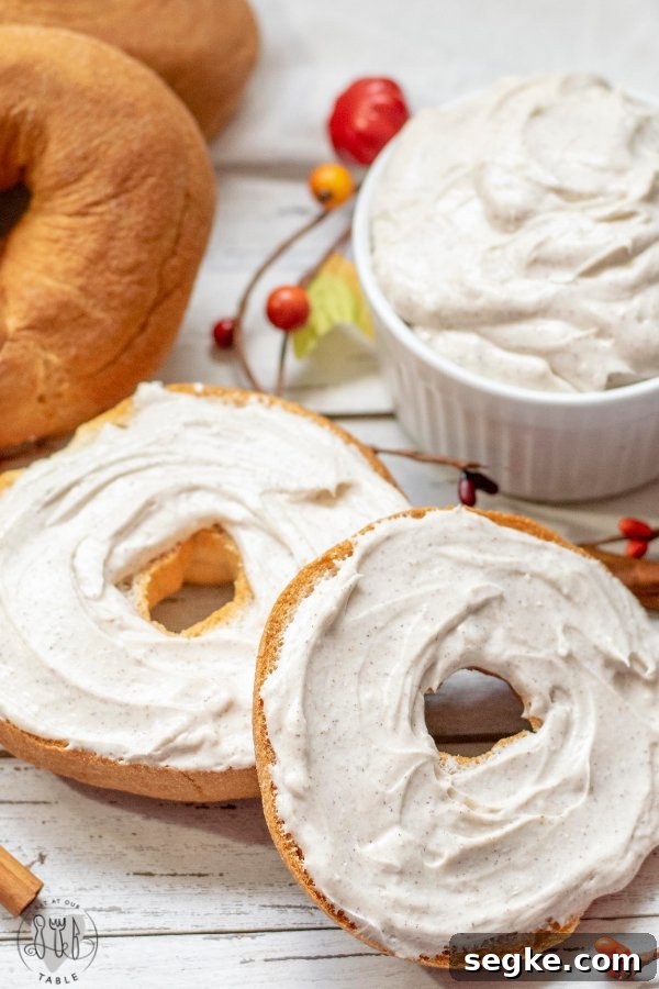 Gluten Free Whipped Maple Cinnamon Cream Cheese Recipe 2 Up close shot of Whipped Maple Cinnamon Cream Cheese on a bagel