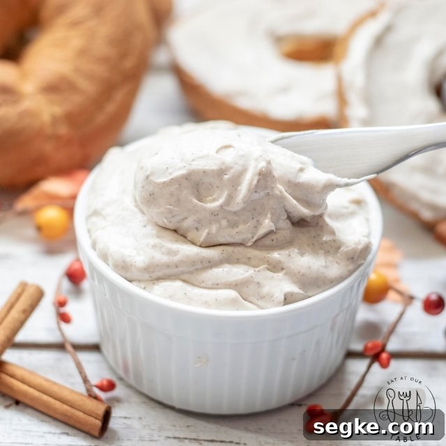 Gluten Free Whipped Maple Cinnamon Cream Cheese Recipe 3 Whipped Maple Cinnamon Cream Cheese in a bowl with a spreading knife