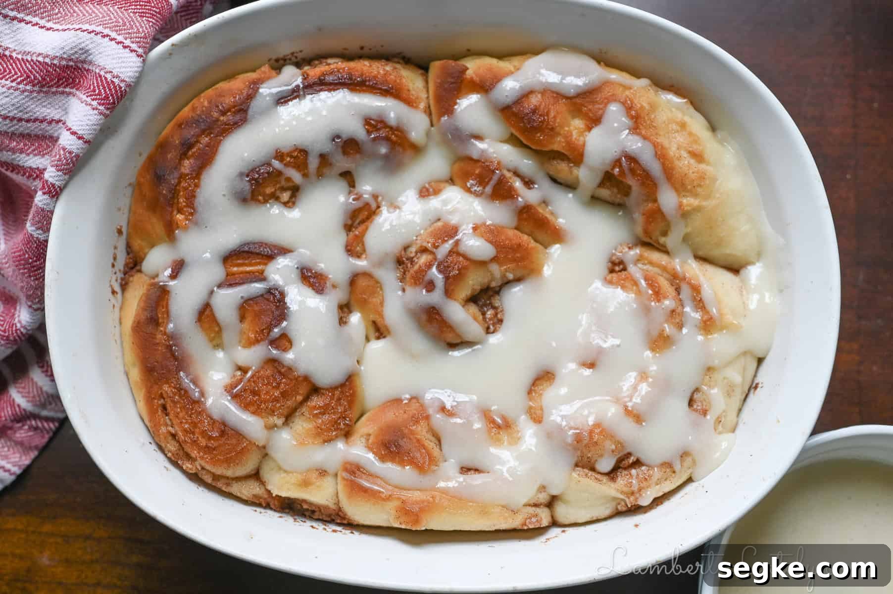 cinnamon rolls drizzled with cream cheese frosting.