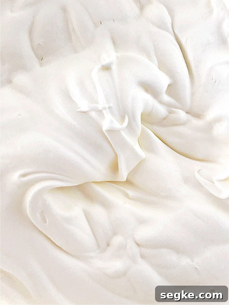 No-Bake Pineapple Cream Cheese Pie 6 Close-up image of whipped cream.