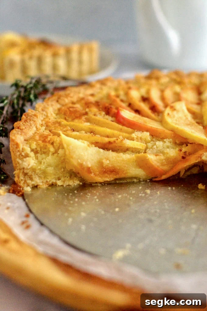 side view of sliced frangipane tart
