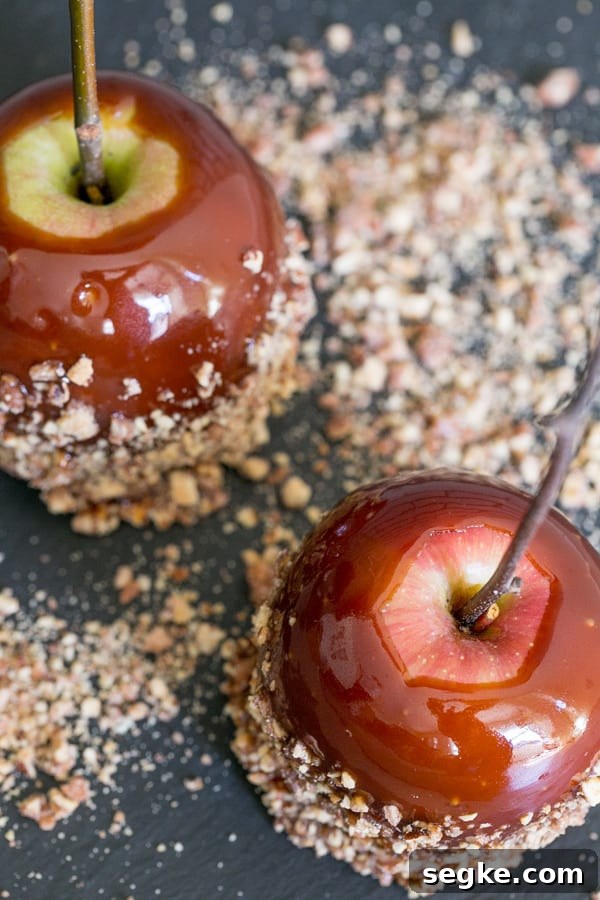 How to Make Bourbon Caramel Apples 3 Bourbon caramel apples with candied pralines