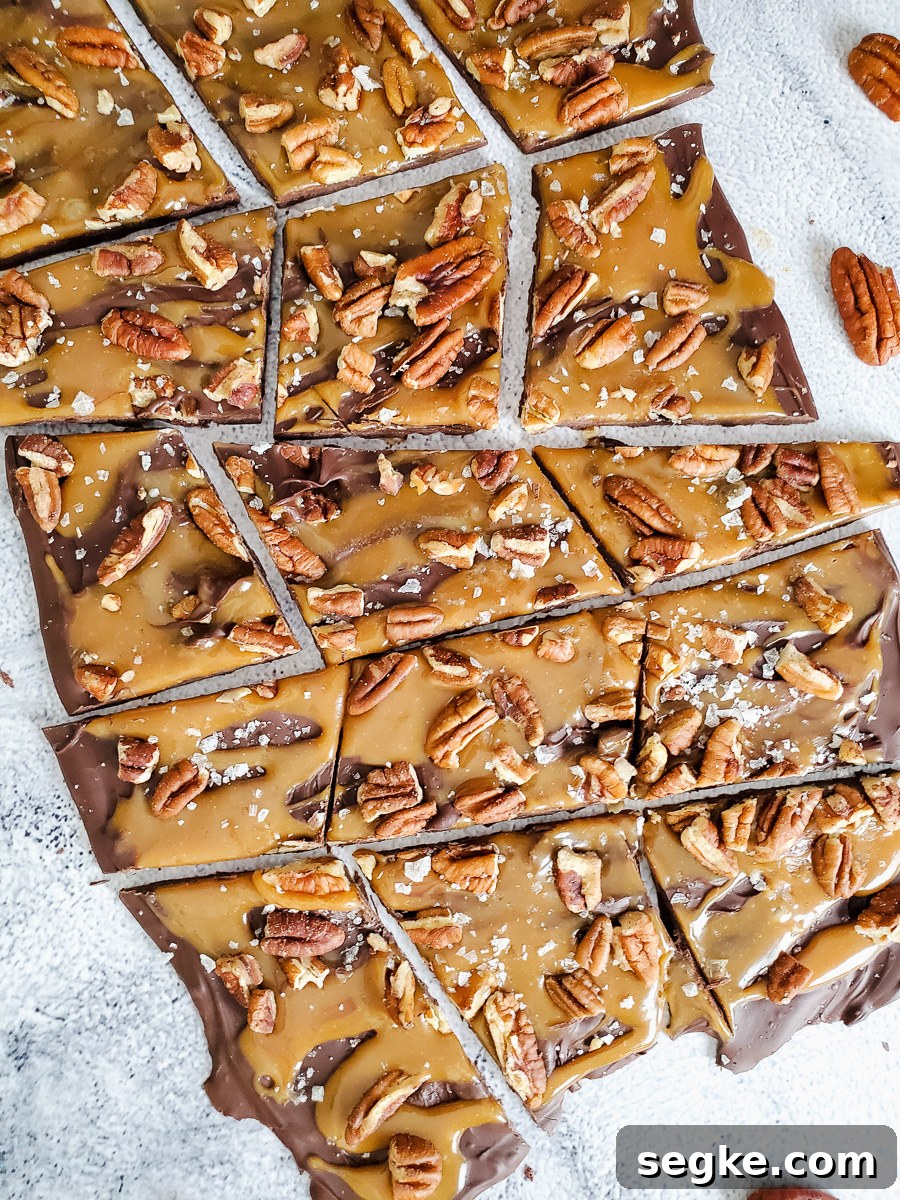 Salted Caramel Chocolate Turtle Bark with Pecans 4 Overhead picture of caramel pecan Turtle bark candy chopped into pieces.