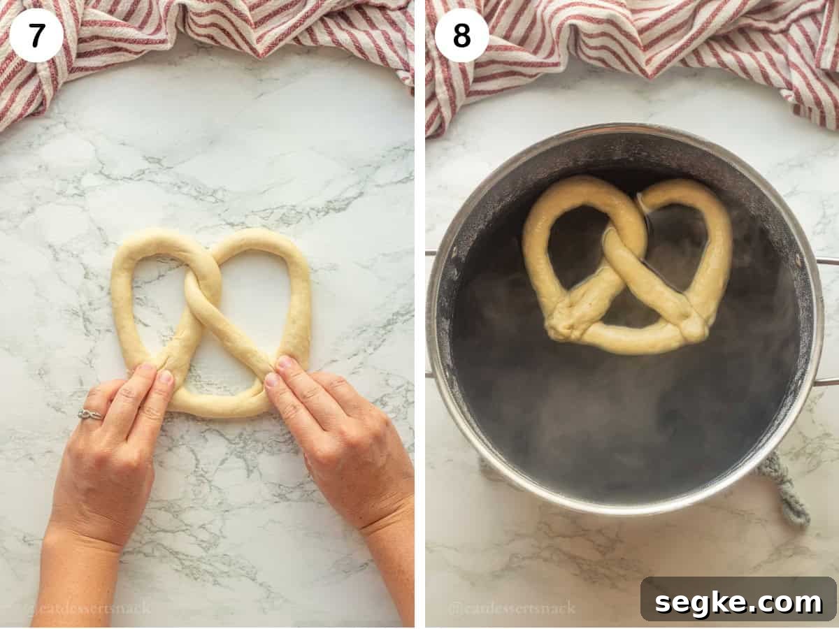 Homemade Soft Baked Amish Pretzels Recipe 7 Hands pressing dough into bottom of pretzel and pot of water with pretzel inside.