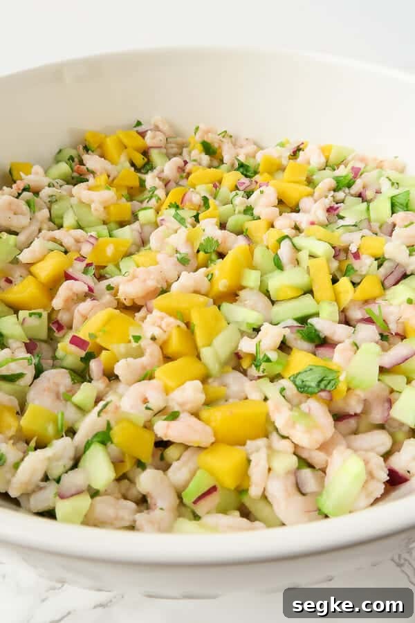 Shrimp Ceviche with Mango and Cucumber Recipe 3 close-up of the easy shrimp ceviche with mango and cucumbers