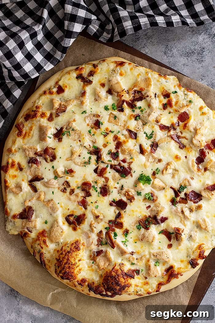 Crispy Chicken Bacon Ranch Pizza Recipe 5 Top down view of Chicken Bacon Ranch Pizza fresh from the oven.
