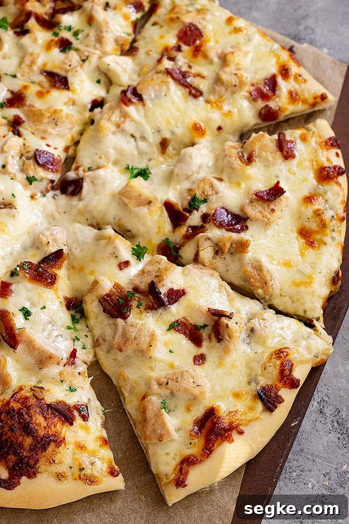 Crispy Chicken Bacon Ranch Pizza Recipe 6 Slices of chicken bacon ranch pizza ready for eating.