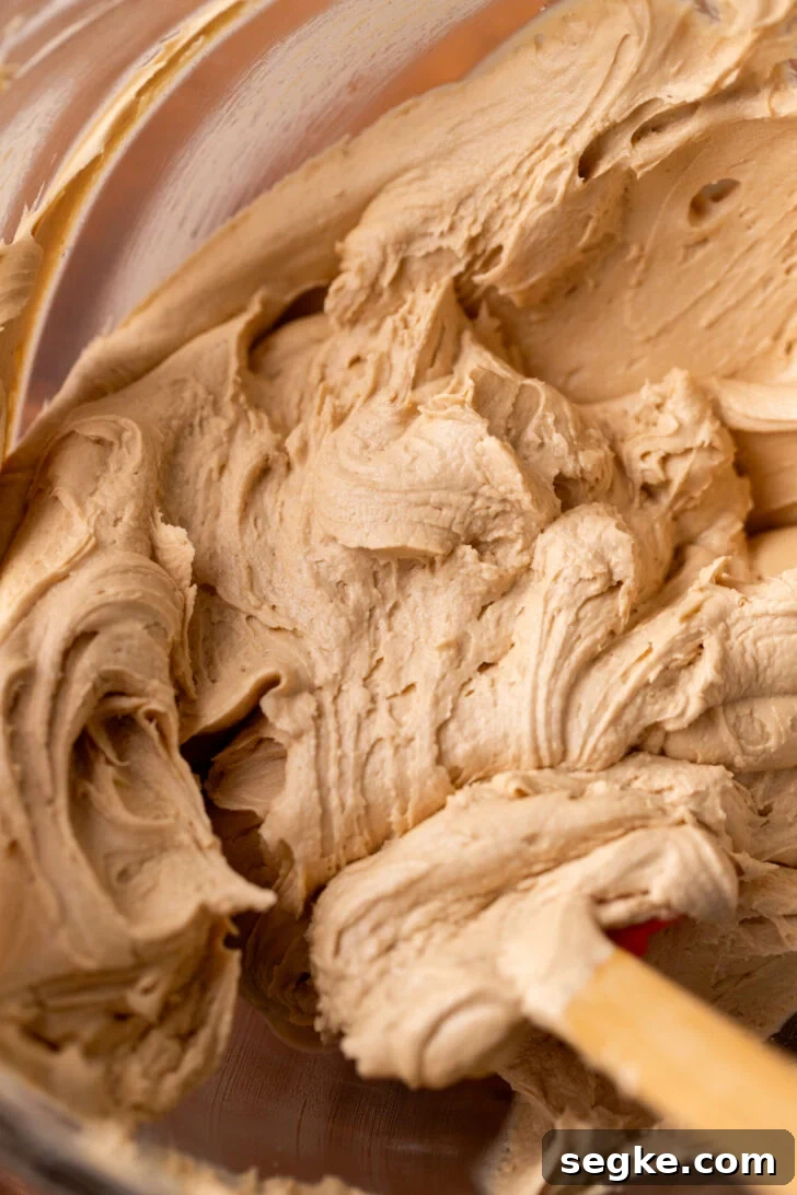 Biscoff Cookie Butter Cake Recipe 4 Cookie butter frosting in a bowl.