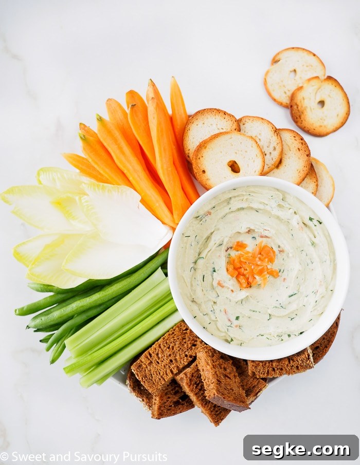 Smoked Salmon and Cream Cheese Dip 3 A Smoked Salmon Cream Cheese Dip served with veggies, bread and bagel crackers.