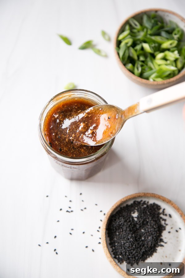 Homemade 5-Ingredient Gluten-Free Teriyaki Sauce and Marinade 9 gluten-free teriyaki marinade in a jar with spoon