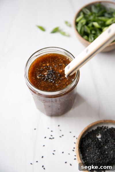 Homemade 5-Ingredient Gluten-Free Teriyaki Sauce and Marinade 7 gluten-free teriyaki marinade in a jar with spoon