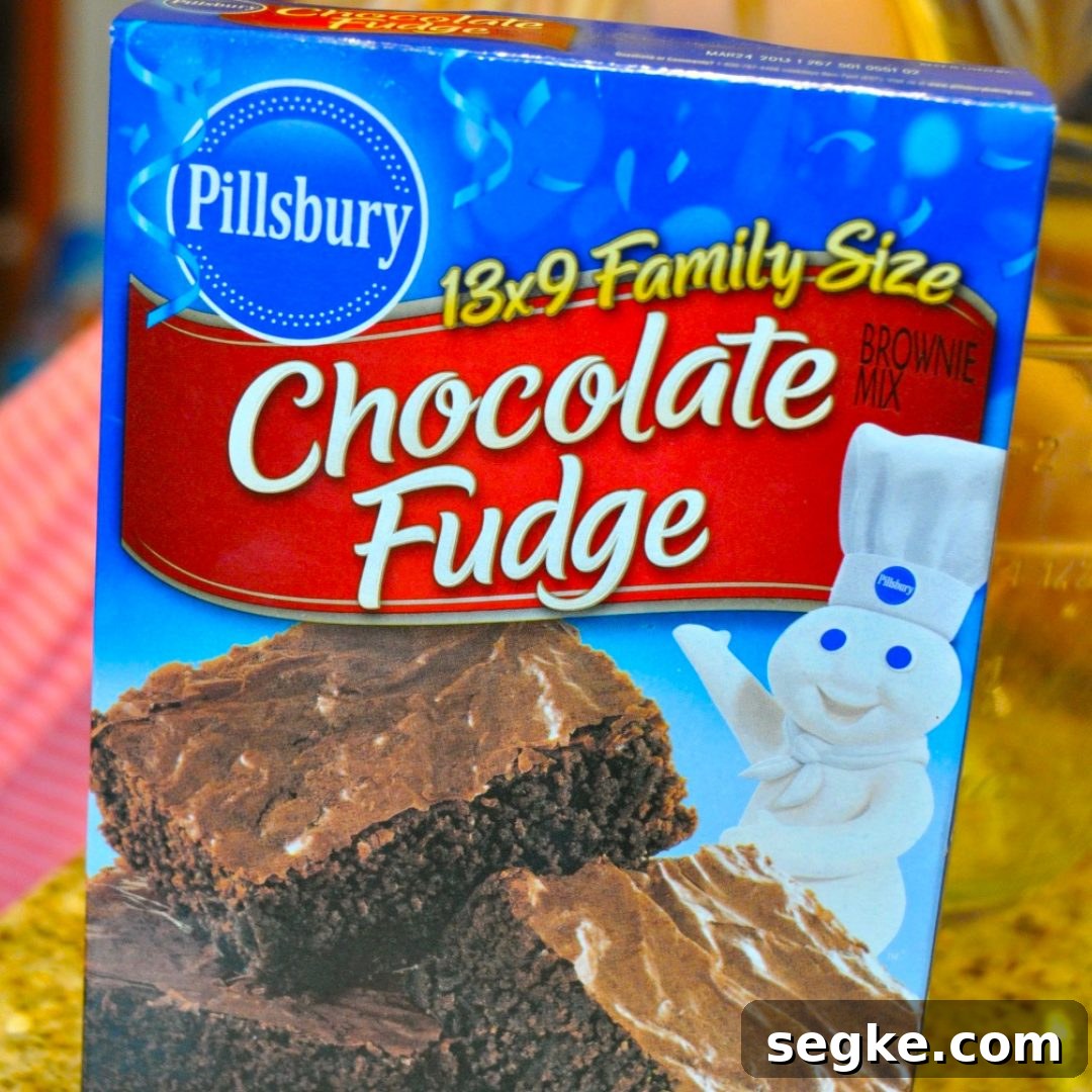 Buckeye brownies are a basic boxed brownie mix topped off with a smooth and creamy peanut butter frosting and chocolate ganache.