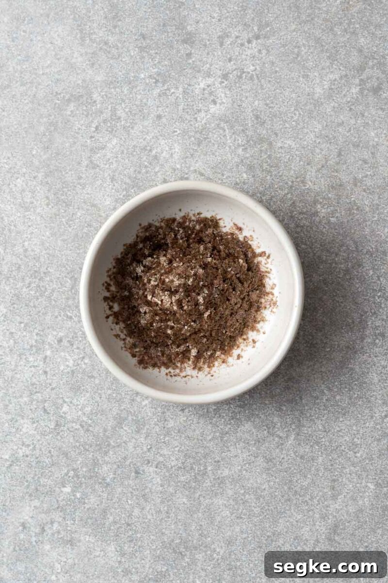 Shichimi Togarashi: Authentic Japanese Seven-Spice Seasoning 3 Seaweed flakes in a small white bowl.